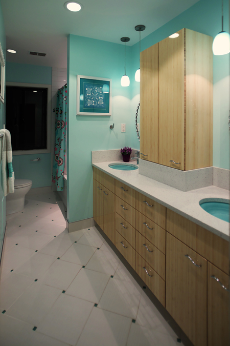 Bathroom with teal walls, bamboo cabinetry, and double head shower - view 2