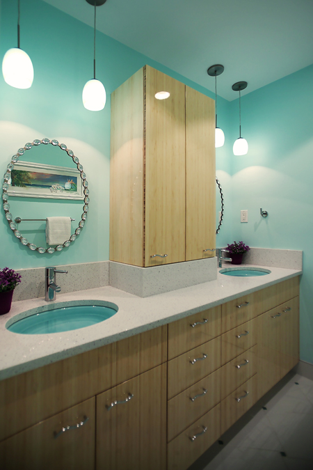 Bathroom with teal walls, bamboo cabinetry, and double head shower - view 2