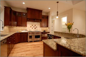 Kitchen Remodel with Brown Cabinets and Granite Countertops 1