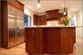 Kitchen Remodel with Brown Cabinets and Granite Countertops 3