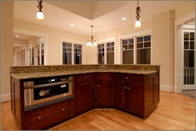 Kitchen Remodel with Brown Cabinets and Granite Countertops 5