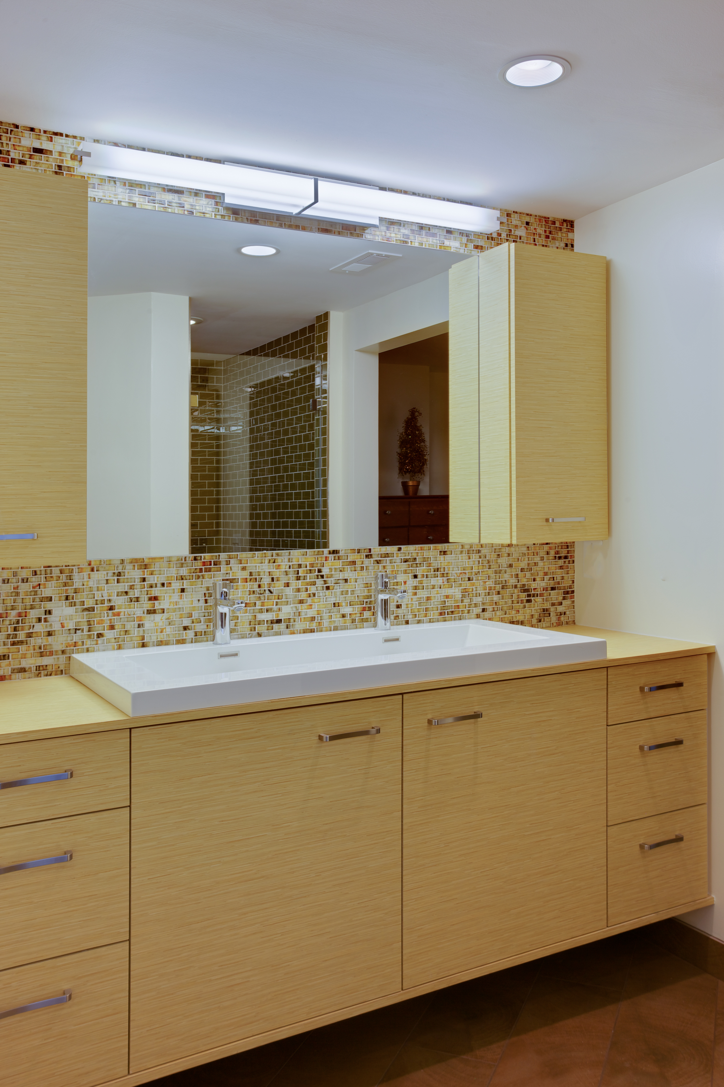 Bathroom with double vanity and yellow, wood cabinetry - view 4 