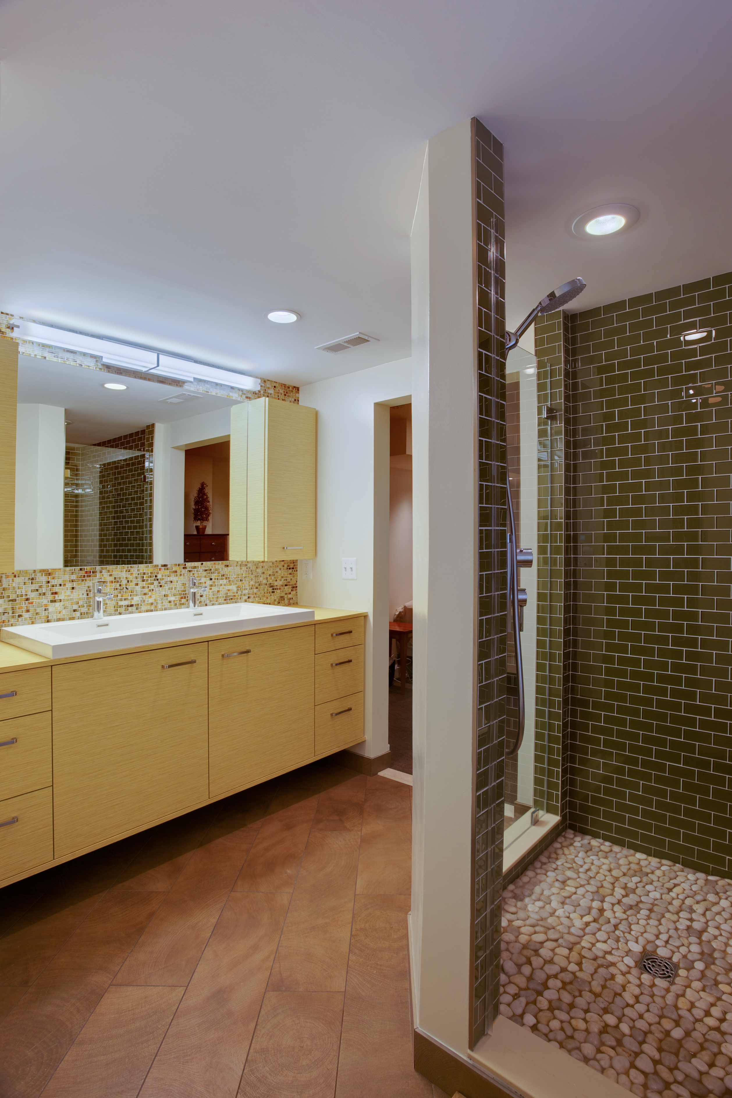 Bathroom with double vanity and yellow, wood cabinetry - view 7